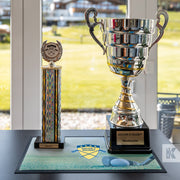 Counter mat used as a trophy display mat in a golf club