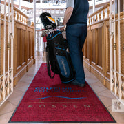 Man with golf bag on a Golf Club branded mat