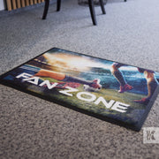 Fan Zone printed mat on a carpeted floor