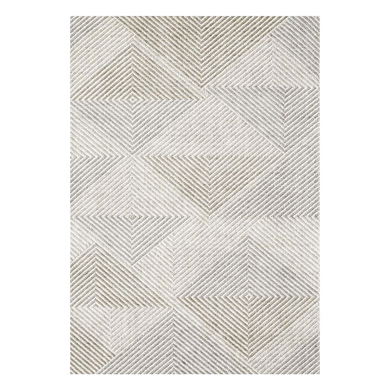 Textured area rug with geometric pattern on a white background