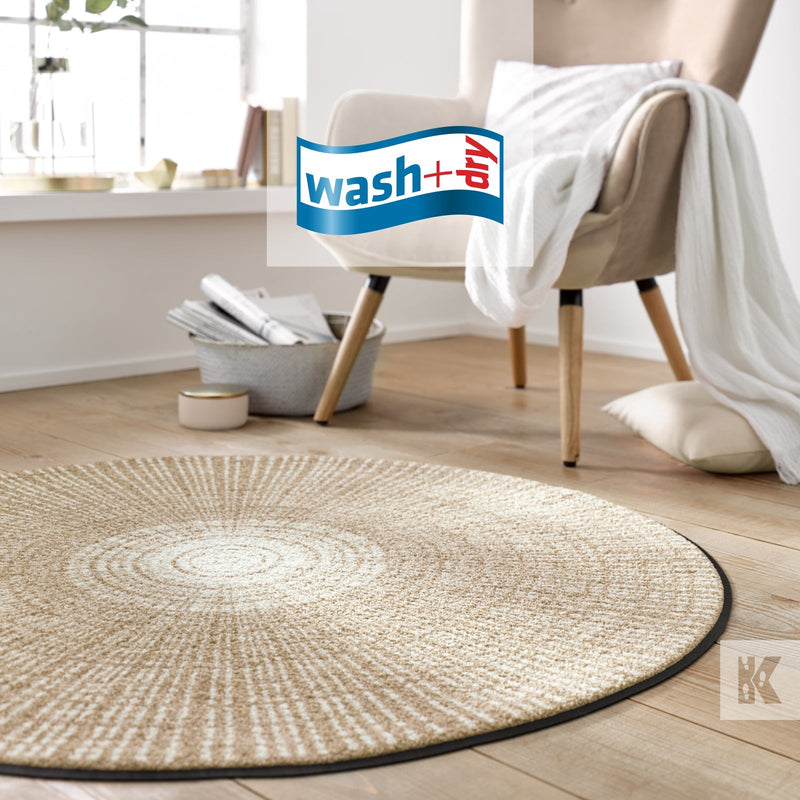 Circular printed mat with a chair and draped white fabric