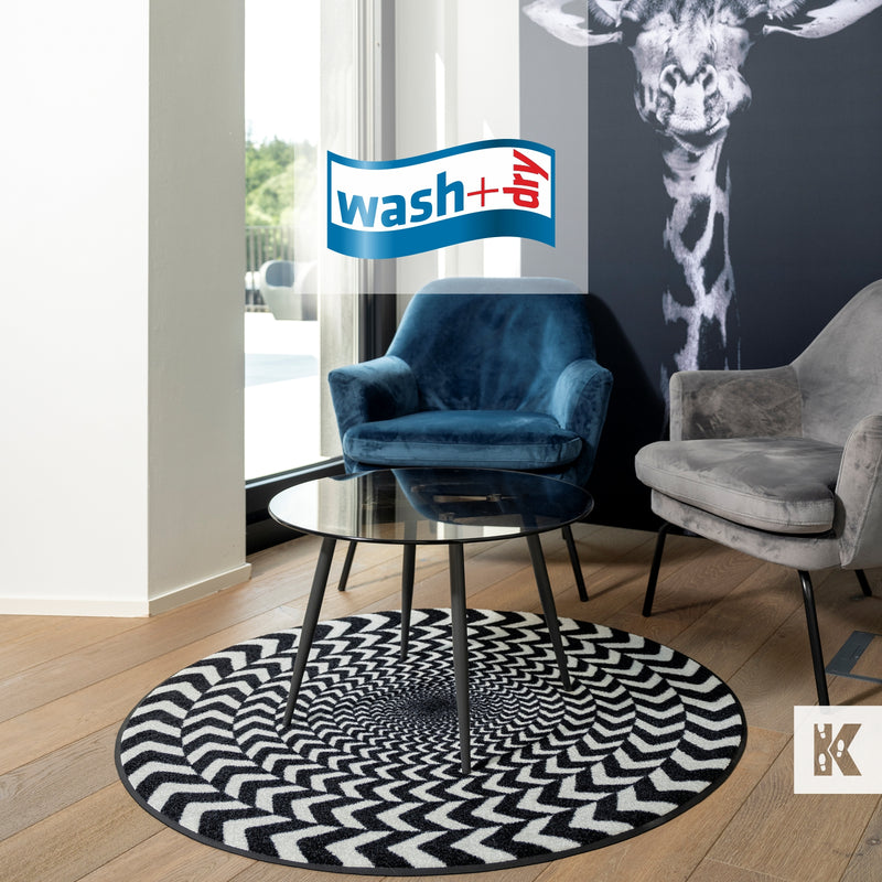 Circular mat with optical illusion and 2 chairs